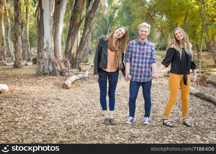 Three Brother and Sisters Portrait Outdoors.