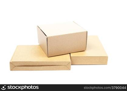 three brown boxs on white isolated background.packshot in studio.