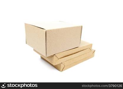 three brown boxs on white isolated background.packshot in studio.