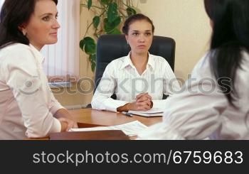 Three Business Women are Discussing