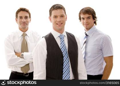 Three businessmen standing together and smiling