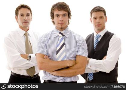 Three businessmen standing with their arms crossed