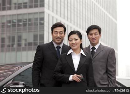Three businesspeople outdoors