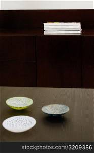 Three ceramic bowls on a table