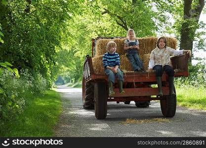 Three Children on Tractor Trailer