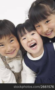 three children smiling