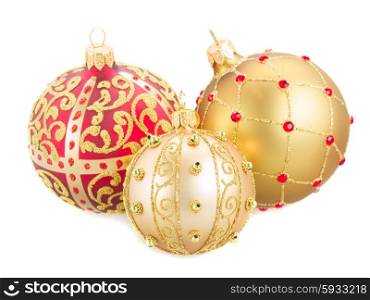 three Christmas balls in gold and red colors isolated on white background. ThreeChristmas balls