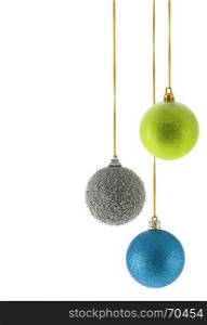 Three Christmas balls isolated over the white background