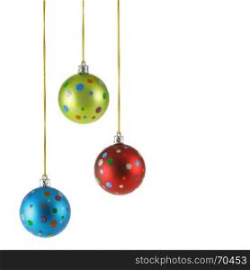 Three Christmas balls isolated over the white background with copyspace