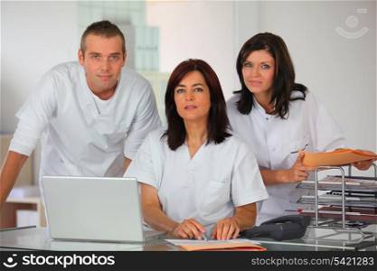 Three clinic workers