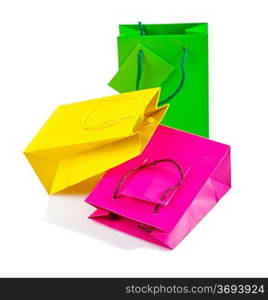 three clored paper bags isolated