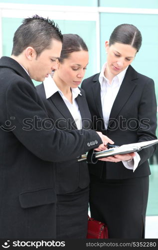 Three colleagues debating