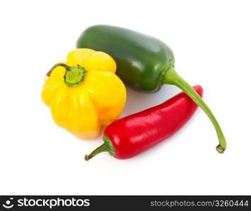 Three colored chili pepper vegetables isolated on white background