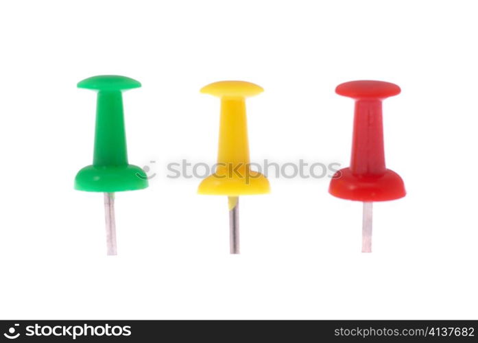 Three colored pins isolated on white background