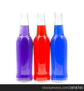 Three colorful bottles, isolated on white background