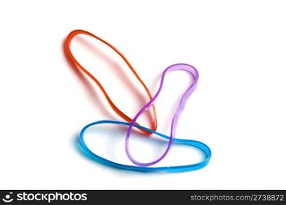 Three colorful rubber bands isolated on white background