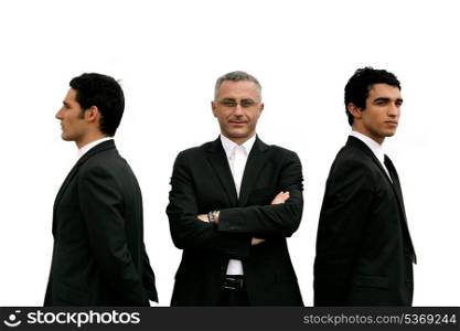 Three confident men standing on white background