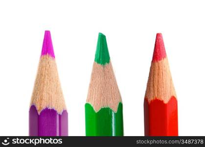 Three crayons vertically on a white background