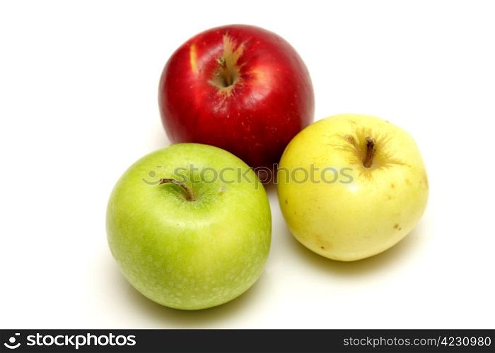 Three different colored apples