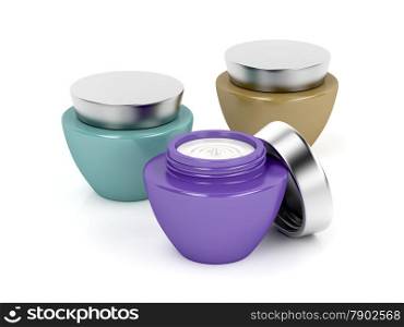 Three different cosmetic creams on white background