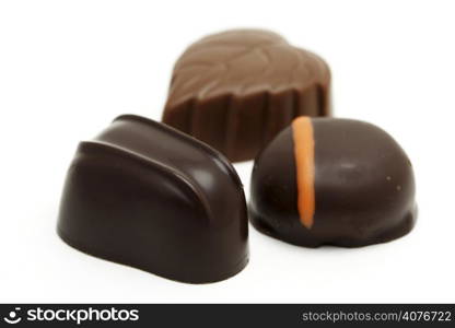 Three different kind of chocolates (isolated white)