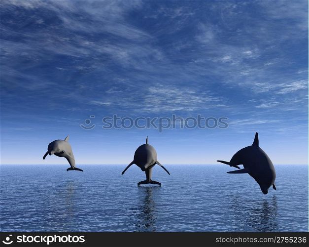 Three dolphins floating at ocean (view in front)
