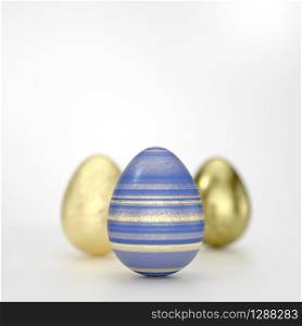 Three Easter eggs art concept with striped black golden decoration in close-up against grey background with copy space