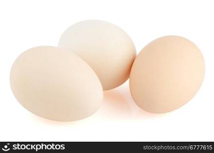 Three eggs isolated on white background.