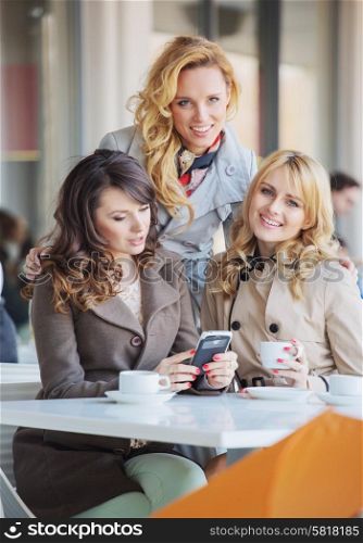 Three fabulous ladies drinking coffee