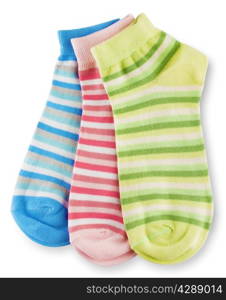 Three fashion multicolored striped socks isolated on white background