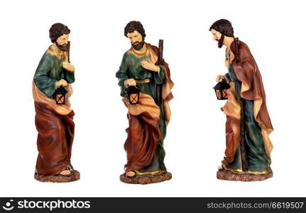 Three figures of Saint Joseph of the Nativity scene isoalted on a white background