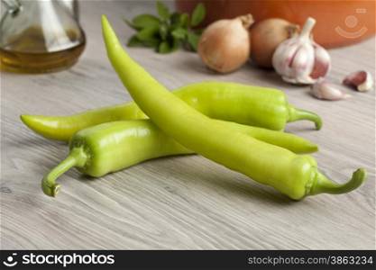 Three fresh raw green turkish peppers