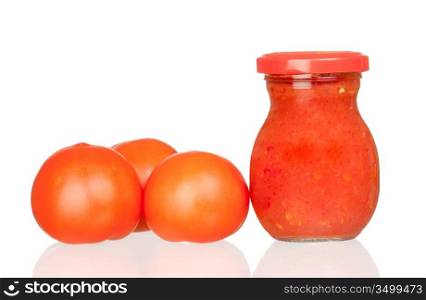 Three fresh tomatoes with tomato sauce boat isolated on white background