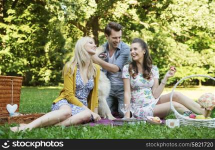 Three friends during the summer picnic