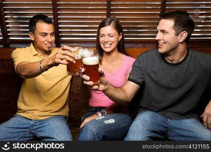 Three Friends Toasting With Beers