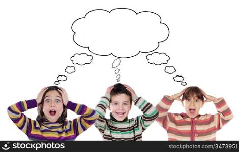 Three funny children surprised on a white background