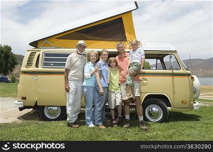 Three generational family with campervan
