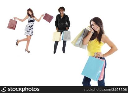 Three girls shopping on a over white background