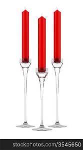 three glass candlesticks with red candles isolated on white background
