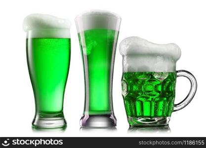 Three glasses of different shapes filled fresh natural green alcoholic beer drink with extra foam on a white background, copy space. Happy St.Patrick &rsquo;s Day concept.. Natural organic green beer in the different glasses.