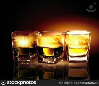 Three glasses of whiskey. Three glasses of whiskey with nature illustration in