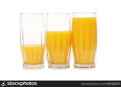 Three glasses with orange juice isolated on white