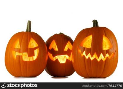 Three glowing cute Halloween Pumpkins isolated on white background. Three Halloween Pumpkins