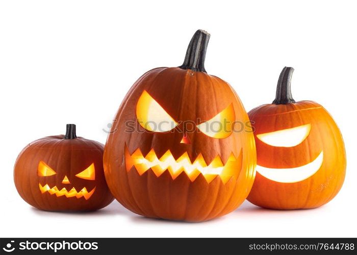 Three glowing cute Halloween Pumpkins isolated on white background. Three Halloween Pumpkins