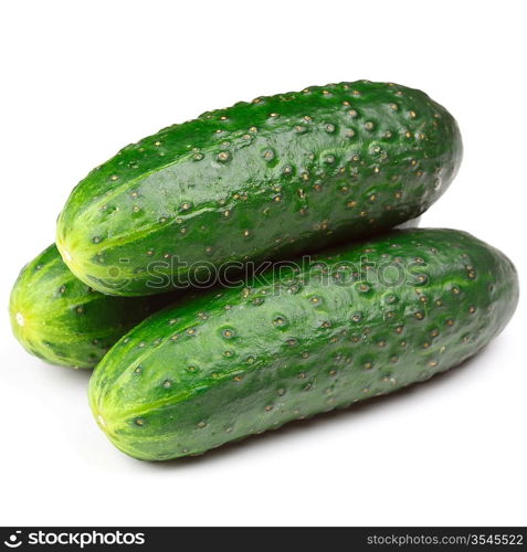 Three green cucumbers isolated on white background