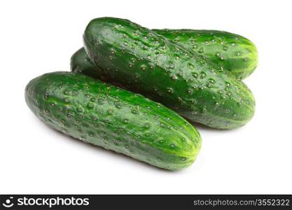 Three green cucumbers isolated on white background