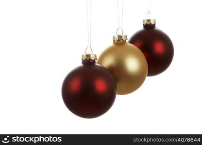 Three hanging christmas tree ornaments (isolated white)