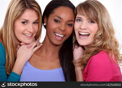 Three happy female friends