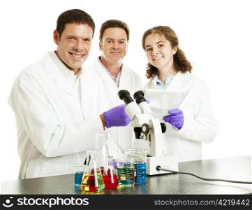 Three happy scientists in their laboratory. Isolated on white.