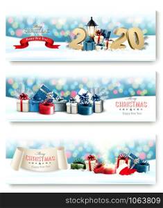 Three Holiday Christmas banners with presents, magic box and 2020. Vector.
